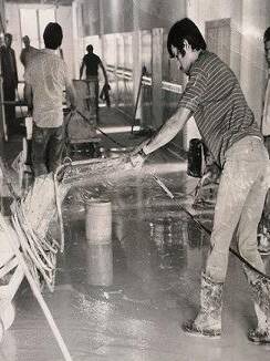 Men working on a terrazzo floor
