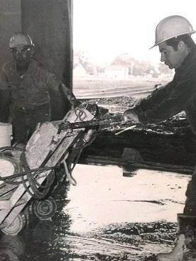Men working on a terrazzo floor