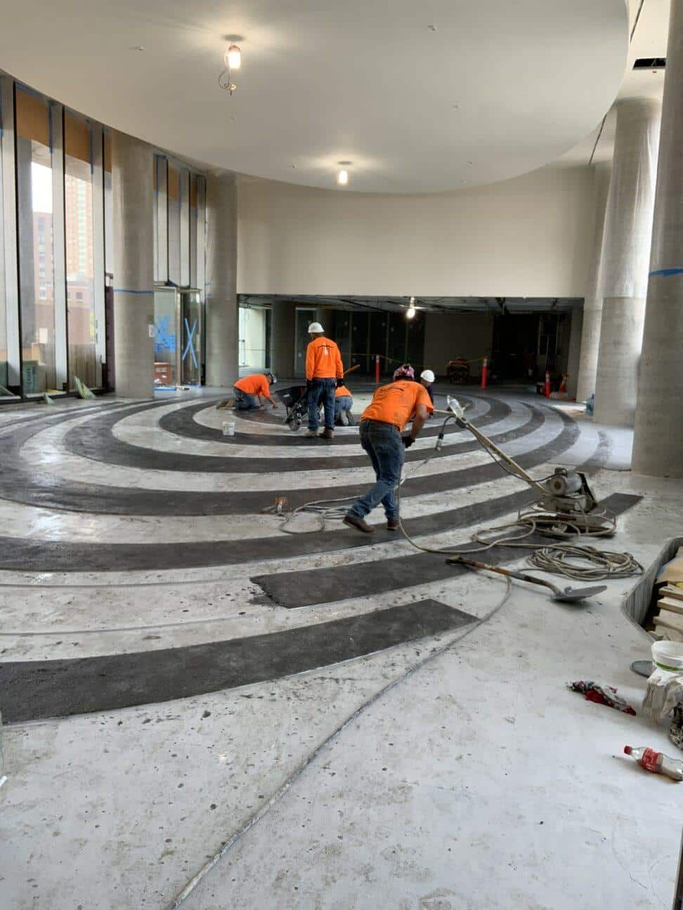 Men working on a terrazzo floor