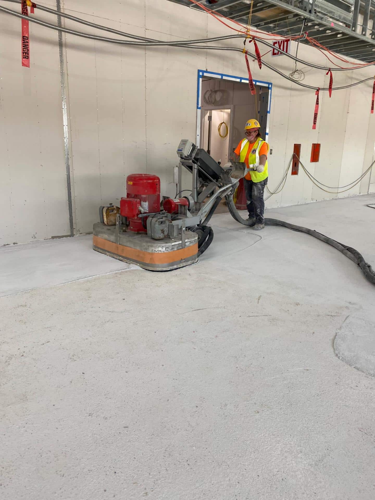 Men working on a terrazzo floor